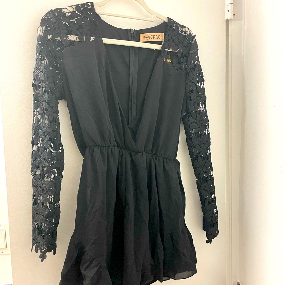 Black long sleeve romper with lace detail